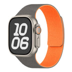Magnetic silicone replacement band for Apple Watch in gray and orange