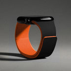 Magnetic silicone replacement band for Apple Watch in black and orange