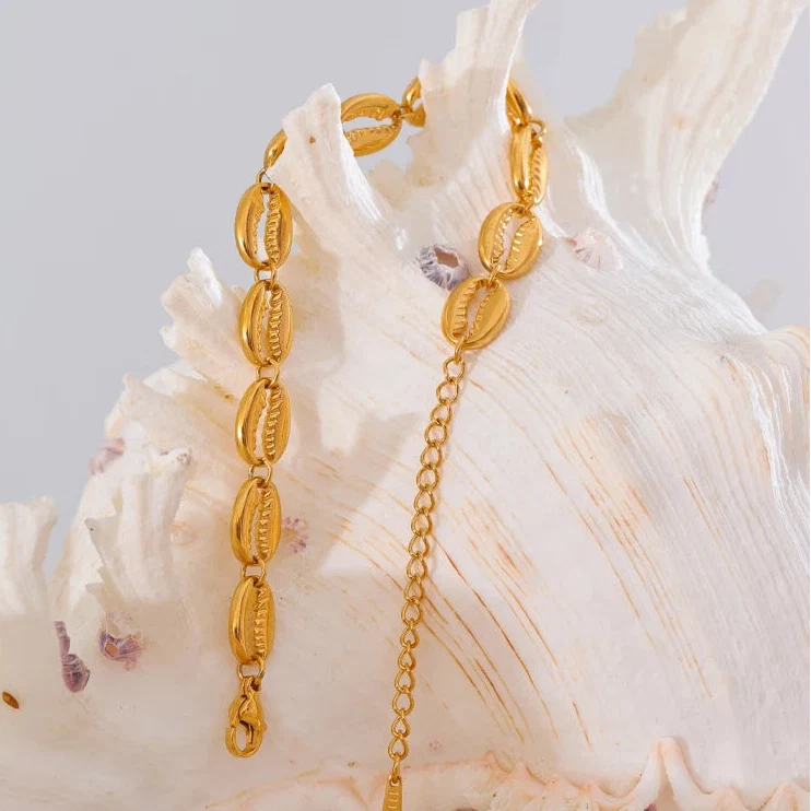 Gold-plated cowrie shell bracelet