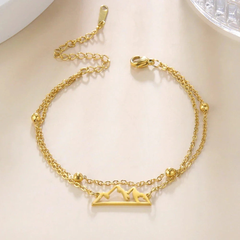Double Bracelet with Gold Mountain Pendant