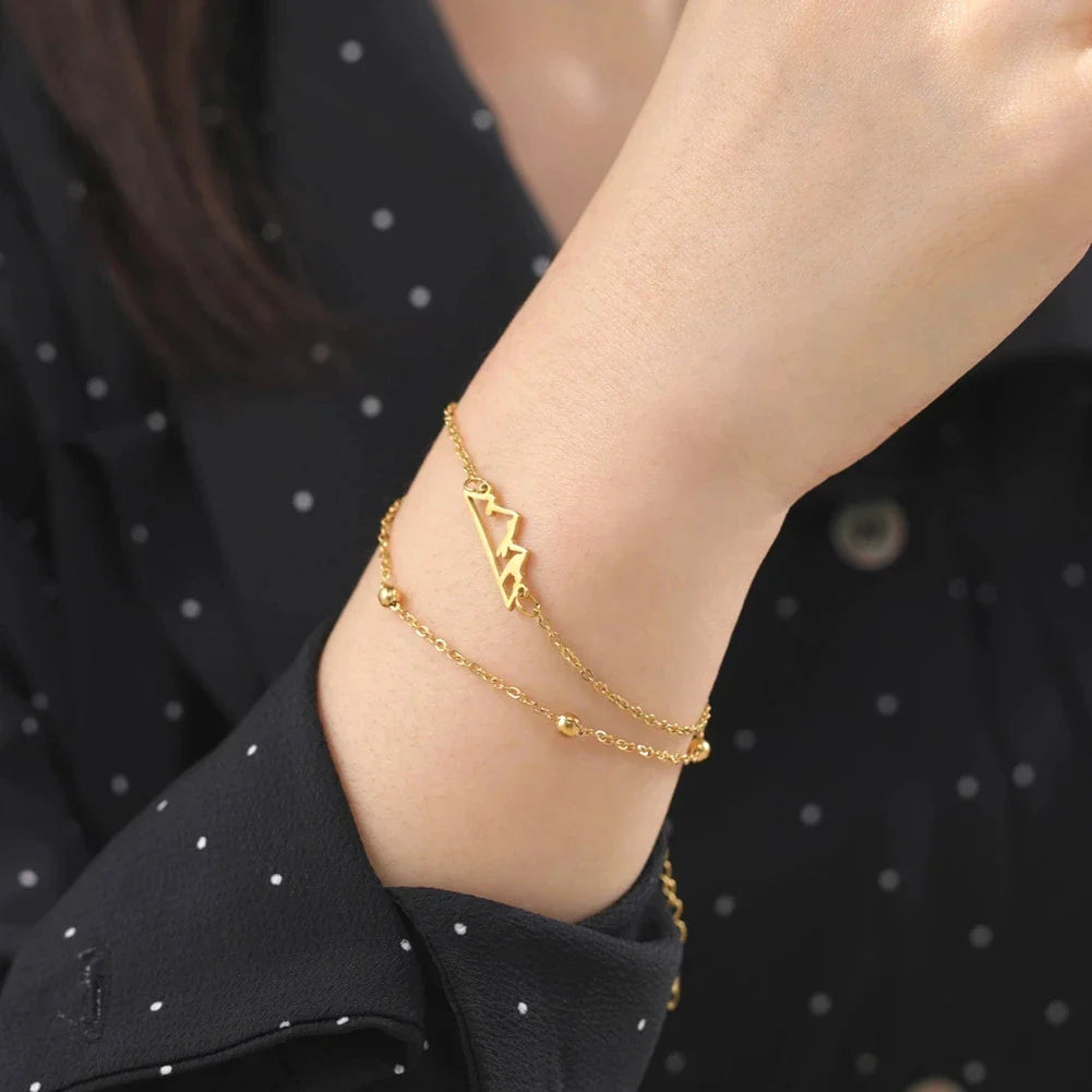 Double Bracelet with Gold Mountain Pendant
