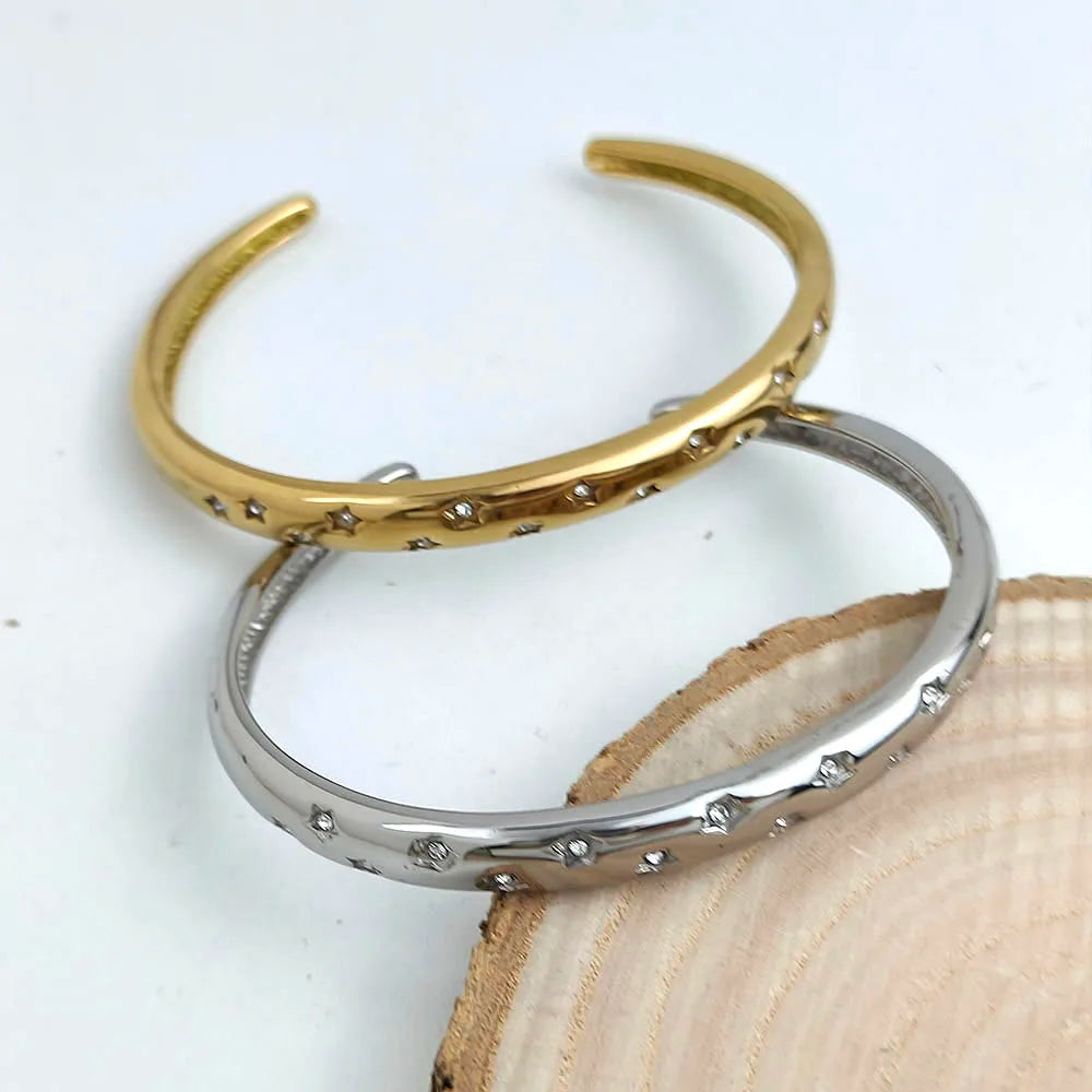 Elegant Bracelet with Gold Stars and Celestial Bodies