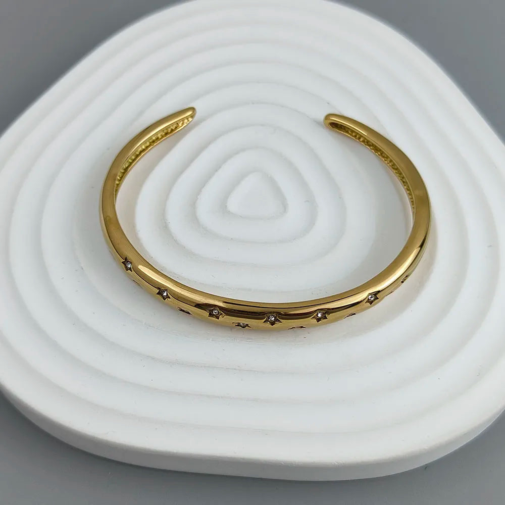 Elegant Bracelet with Gold Stars and Celestial Bodies