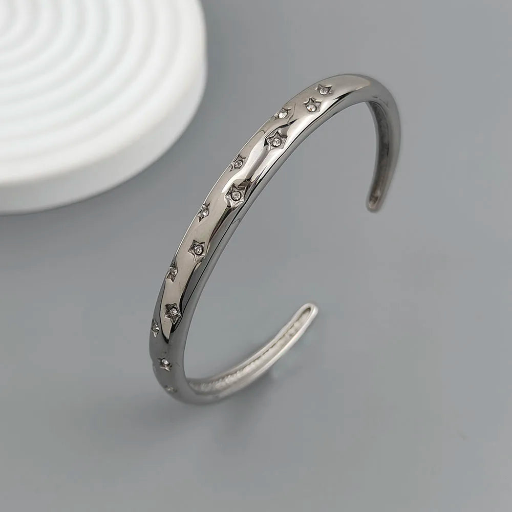 Elegant Bracelet with Silver Stars and Celestial Bodies