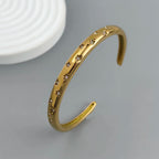 Elegant Bracelet with Gold Stars and Celestial Bodies