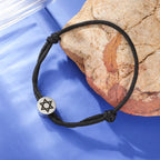 Rope bracelet with the Jewish symbol, the Star of David in black and silver