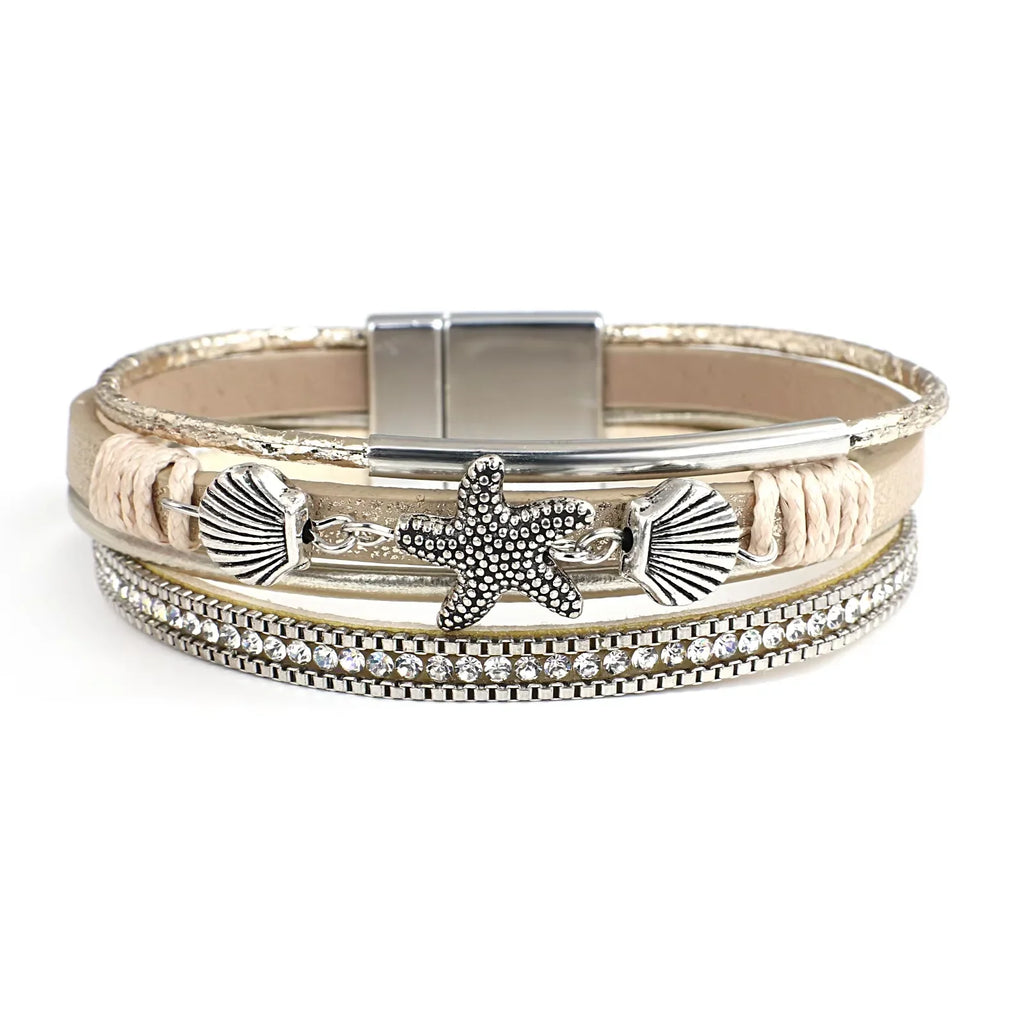 White gold shell and starfish leather bracelet