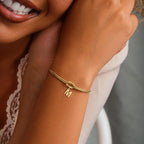 Initial and knot letter bracelet