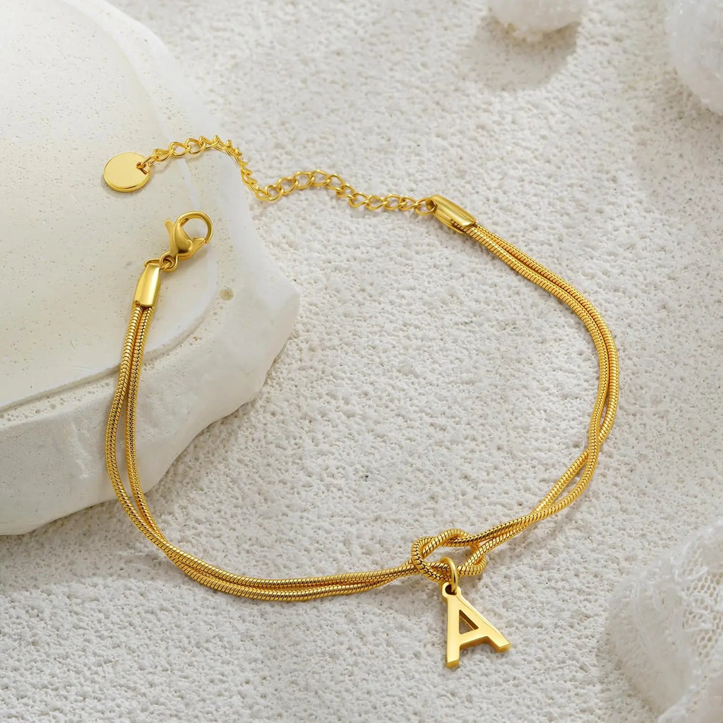 Initial and knot letter bracelet