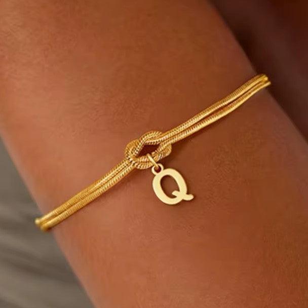 Initial and knot letter bracelet