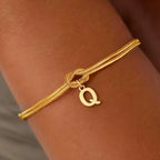 Initial and knot letter bracelet