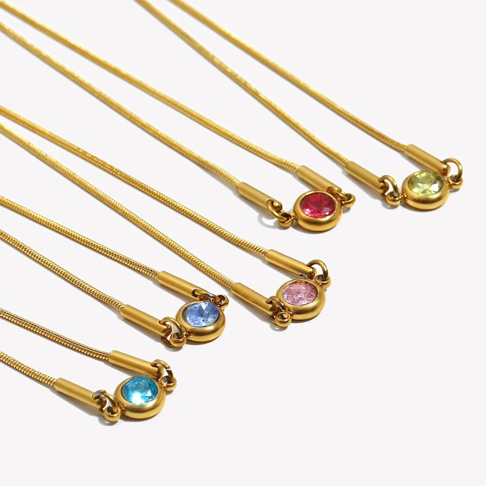 Bangle bracelet with colored birthstone