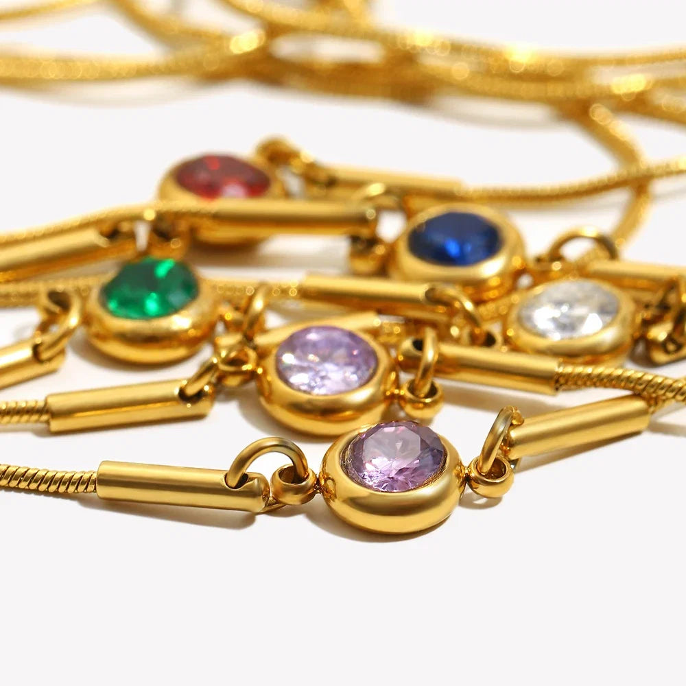 Bangle bracelet with colored birthstone