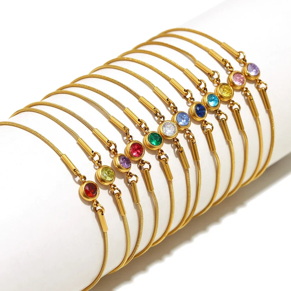 Bangle bracelet with colored birthstone