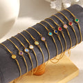 Bangle bracelet with colored January birthstone