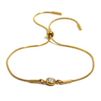 Bangle bracelet with colored birthstone