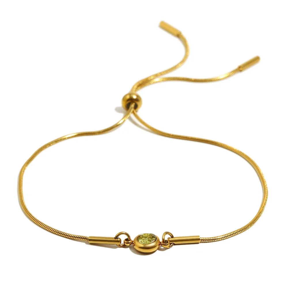 Bangle bracelet with colored birthstone