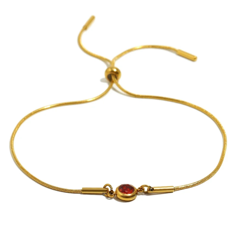 Bangle bracelet with colored birthstone