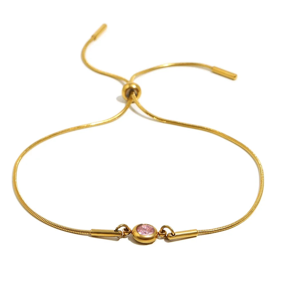 Bangle bracelet with colored birthstone