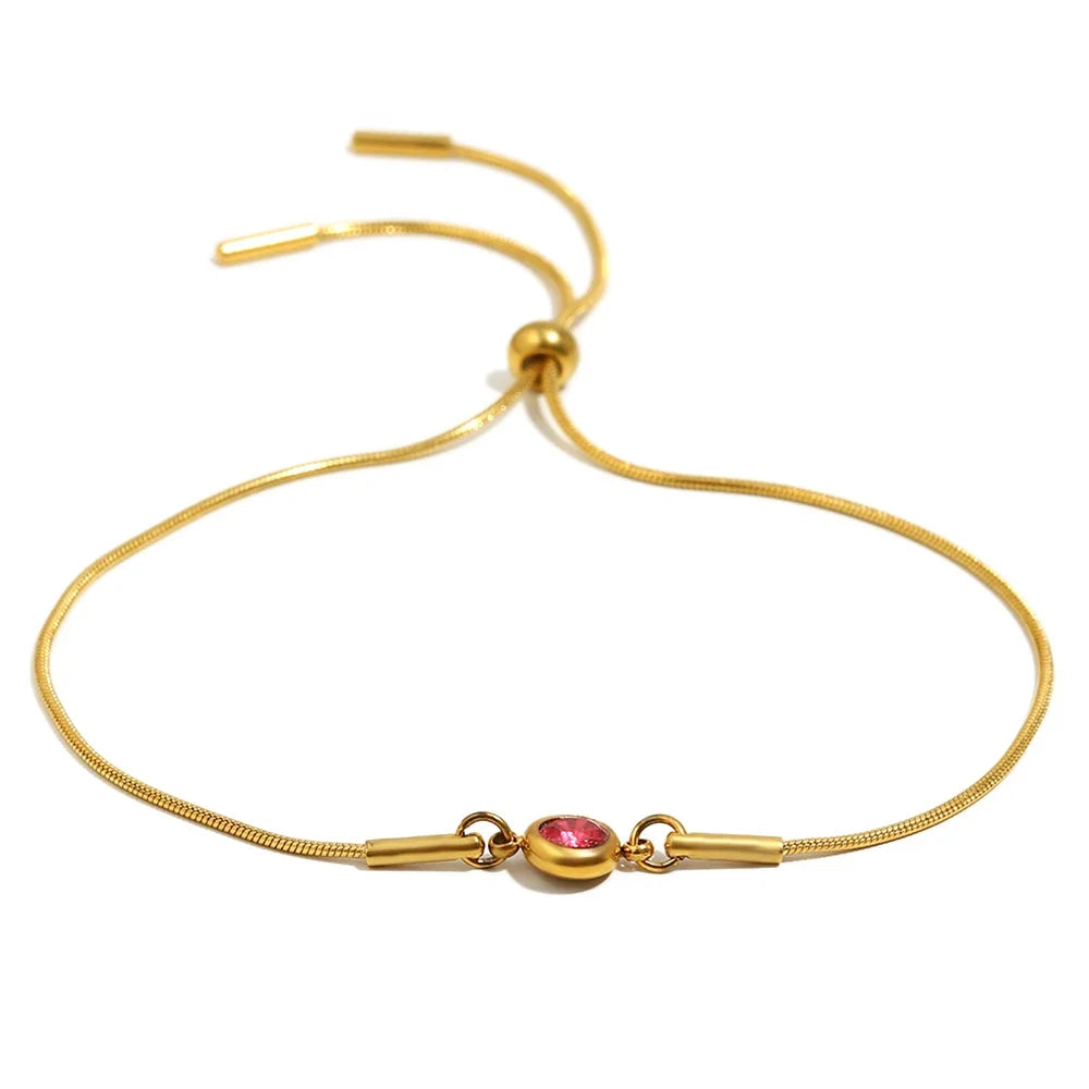Bangle bracelet with colored birthstone