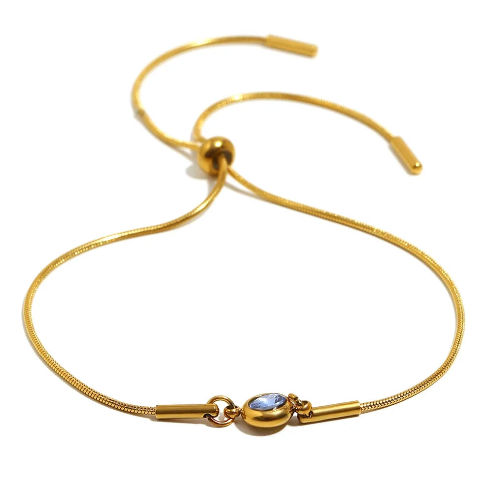 Bangle bracelet with colored birthstone