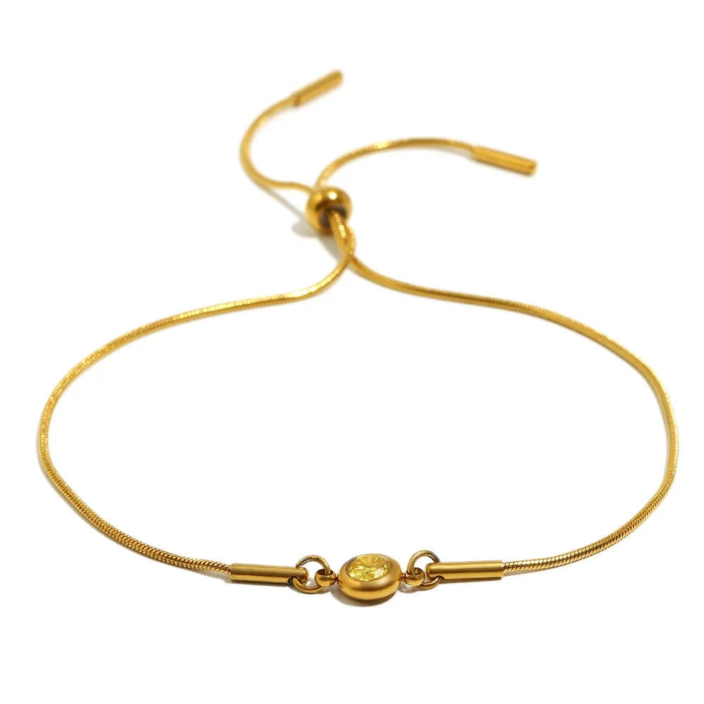 Bangle bracelet with colored birthstone