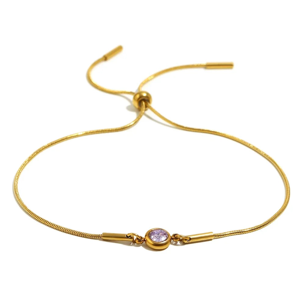 Bangle bracelet with colored birthstone