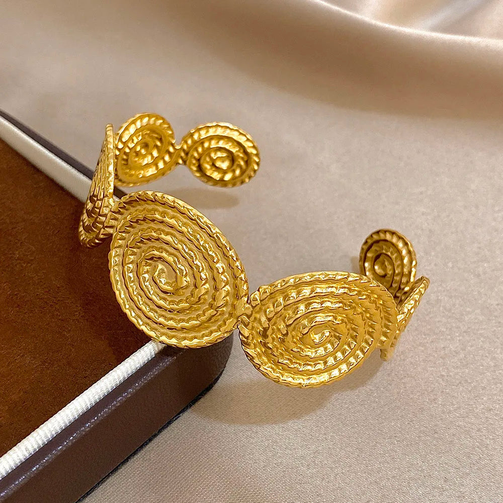 Spiral motif cuff bracelet