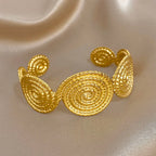 Spiral motif cuff bracelet