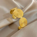 Spiral motif cuff bracelet