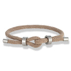 Modern braided cord bracelet with beige knot