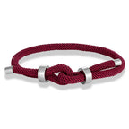 Modern braided cord bracelet with burgundy knot