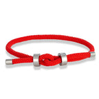 Modern braided cord bracelet with red knot