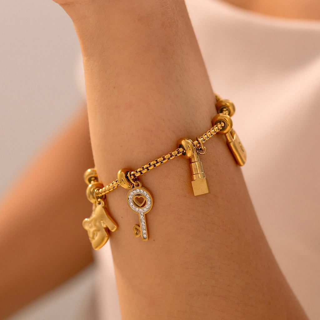 Women's bracelet with keys and padlocks in gold