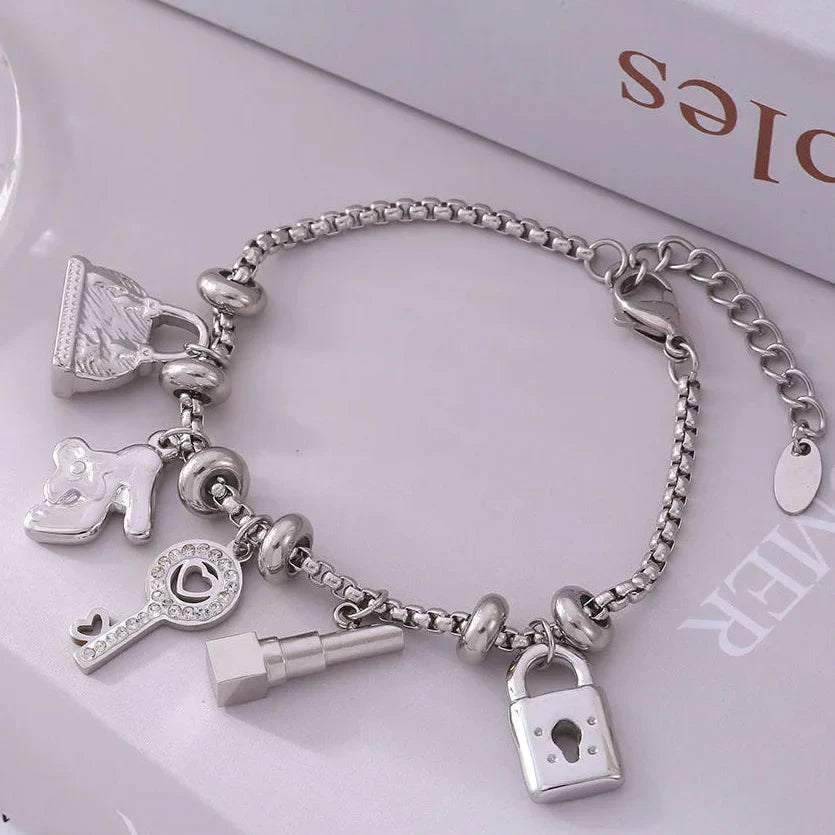 Women's bracelet with keys and padlocks in silver