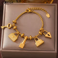 Women's bracelet with keys and padlocks in gold
