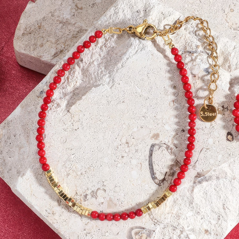 Coral red and gold bracelet