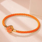 Braided Leather Bracelet with Four-Leaf Clover orange