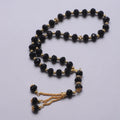 Elegant Muslim prayer beads - Islamic tasbih 33 beads black and gold