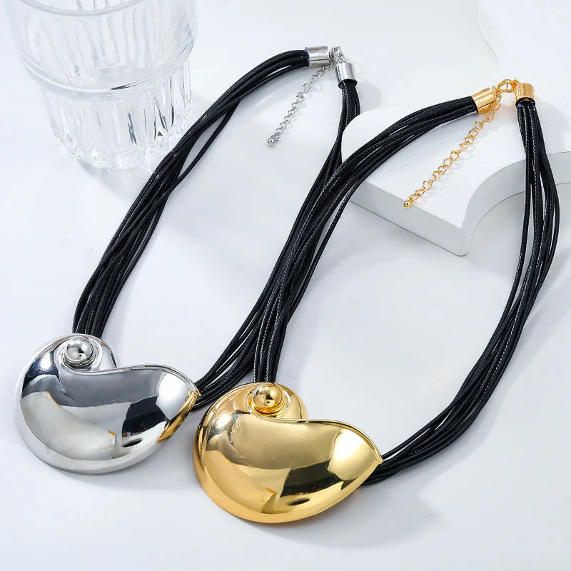 Necklace with Large Gold Snail Shell Pendant