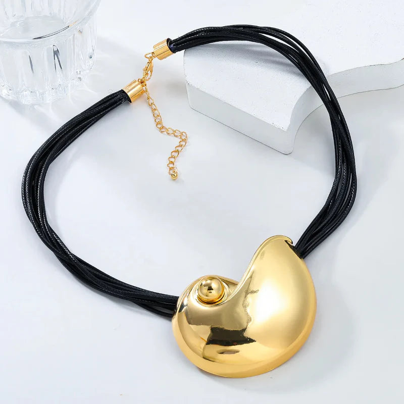 Necklace with Large Gold Snail Shell Pendant