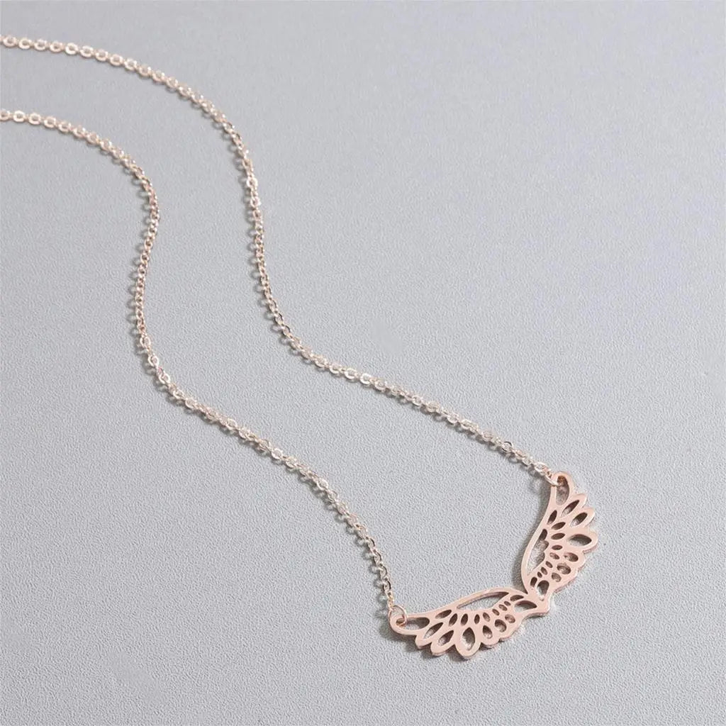 Necklace with large rose gold angel wings pendant