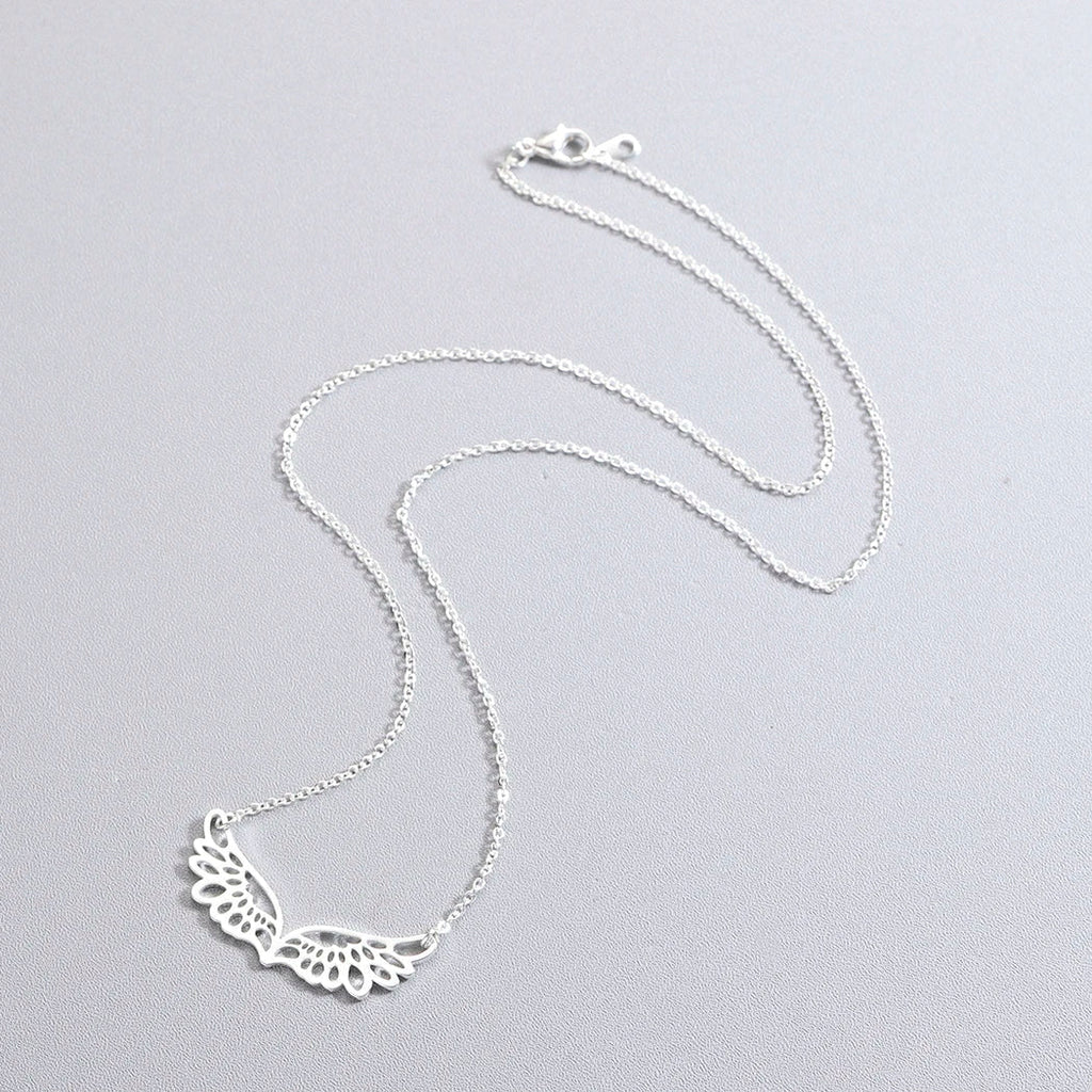 Necklace with large silver angel wings pendant