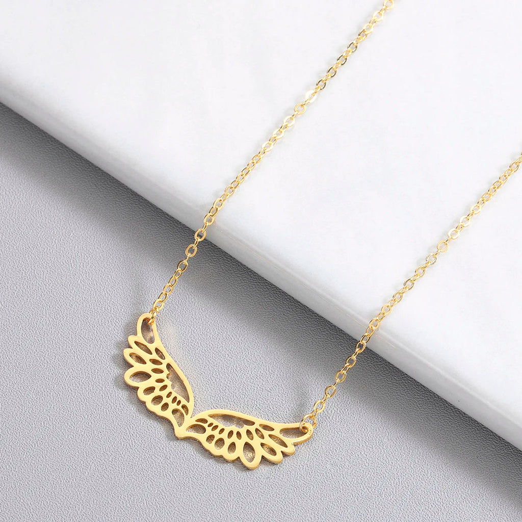 Necklace with large gold angel wings pendant