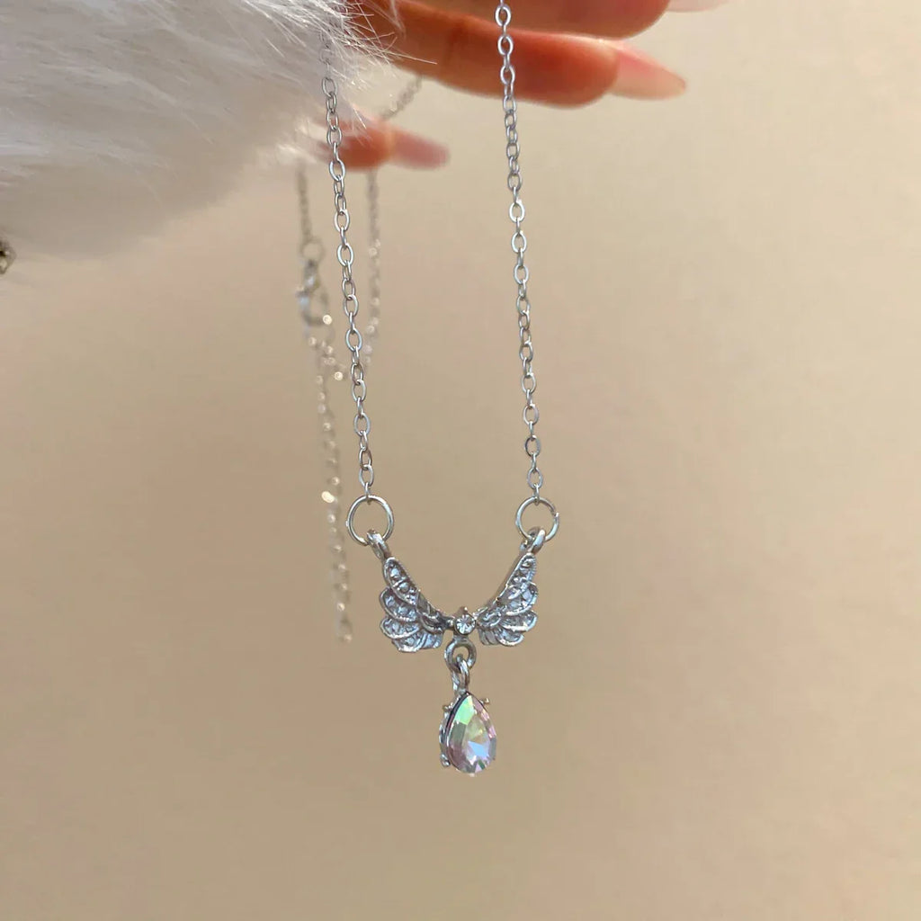 Necklace with angel wing pendant