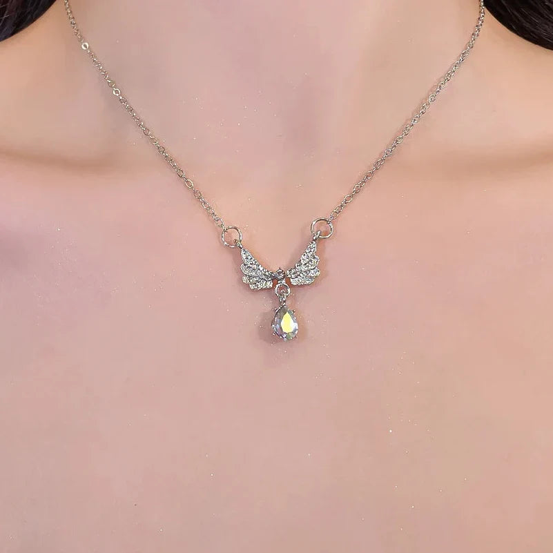 Necklace with angel wing pendant