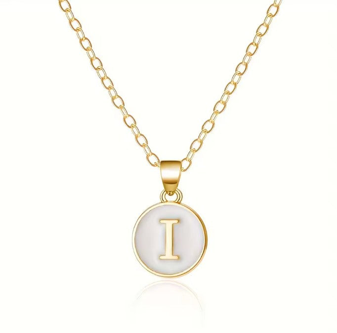 Necklace with white initial letter pendant