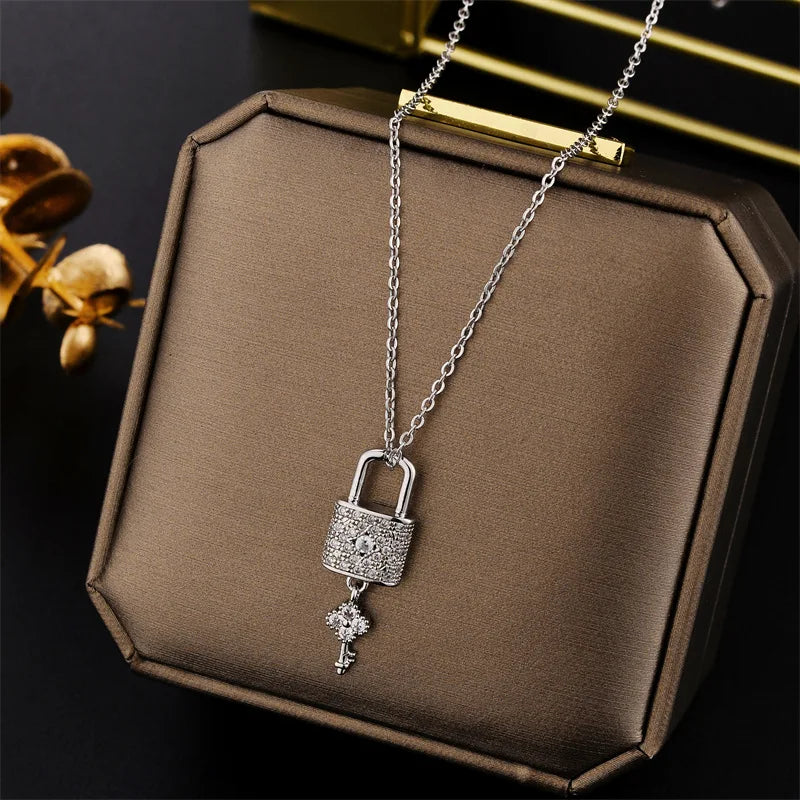 Necklace with key and lock pendant in silver