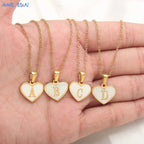 Necklace with white heart pendant initial