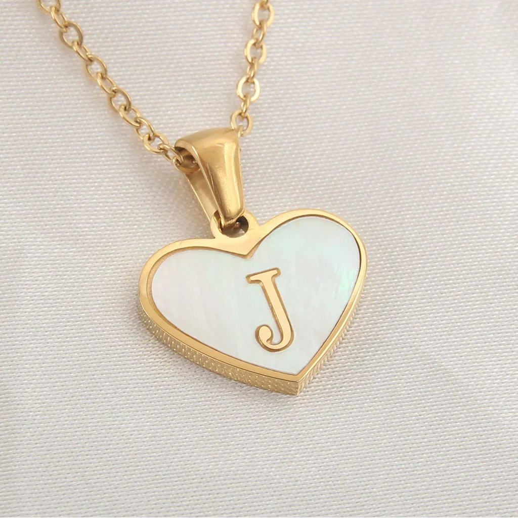 Necklace with white heart pendant initial j
